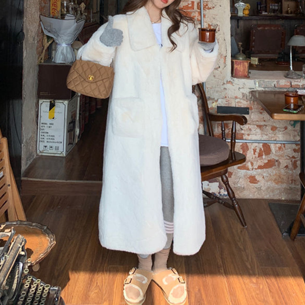 Manteau en fourrure peluche mi-long