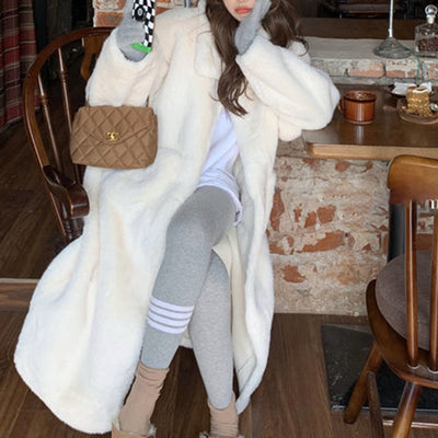 Manteau en fourrure peluche mi-long
